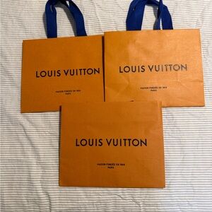 Louis Vuitton Bold Orange Bags with Blue Handles